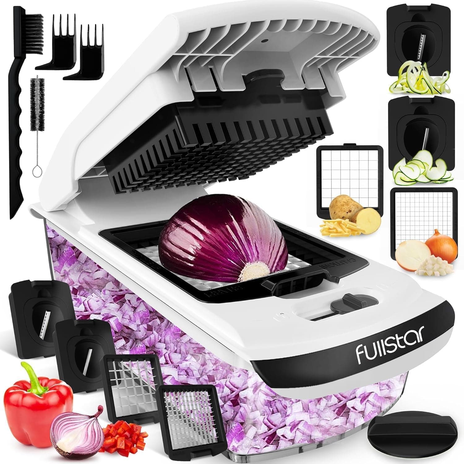 A white Fullstar 4-in-1 vegetable chopper with a half red onion placed under the chopping lid, surrounded by interchangeable blades, diced vegetables, and cleaning tools on a white background.