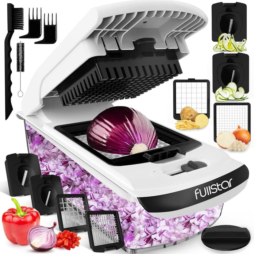 A white Fullstar 4-in-1 vegetable chopper with a half red onion placed under the chopping lid, surrounded by interchangeable blades, diced vegetables, and cleaning tools on a white background.